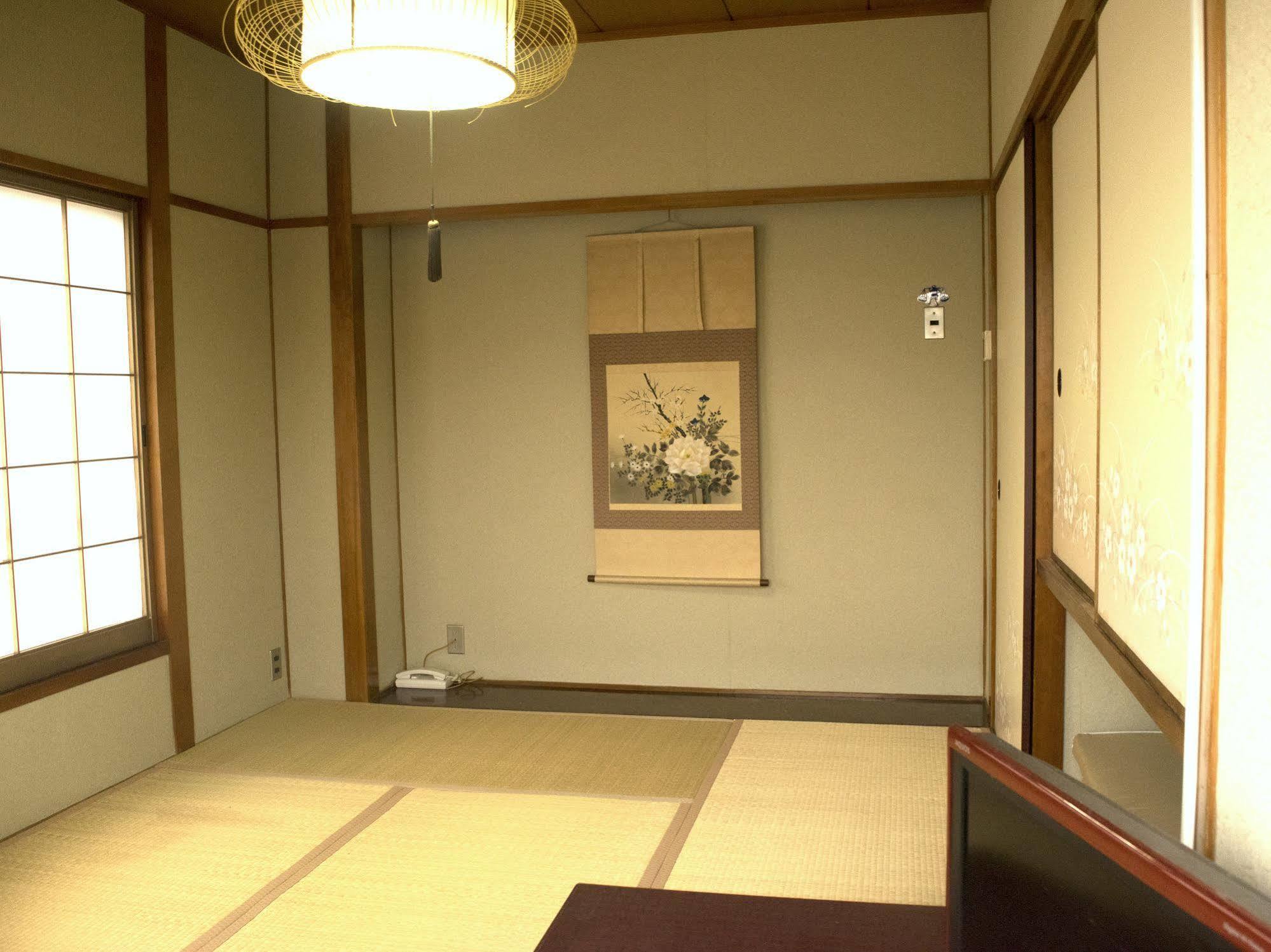 Отель Yamabe Tenri Экстерьер фото